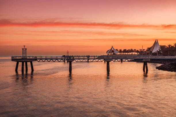 istock Pier in Kuwait City seen at sunset 1131237113