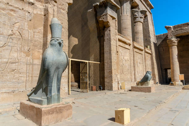 istock Ancient horus statue and reliefs of Edfu temple in Edfu. Egypt 1131237232