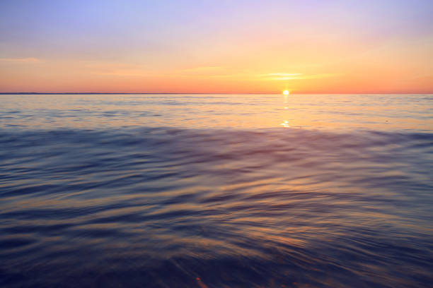 istock early morning sunrise on a choppy river 1131237375
