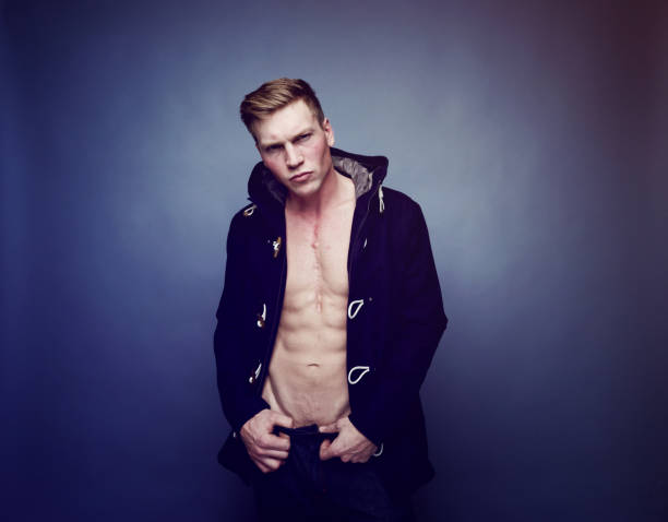 istock Sexy man wearing warm clothing 1131238064