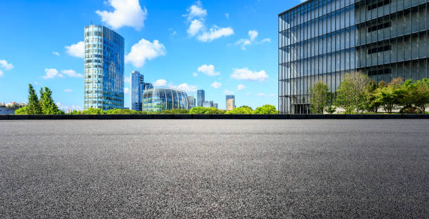 istock Empty asphalt road and modern commercial buildings in Shanghai 1131248819