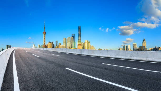 istock Asphalt road passes through Shanghai Lujiazui Financial District 1131248863