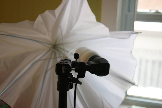 istock umbrella light for portrait photography 1131252389