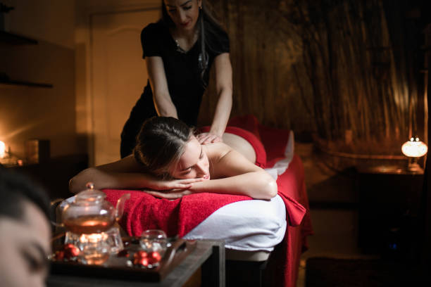 istock Couple having relaxing massage at beauty spa 1131255280