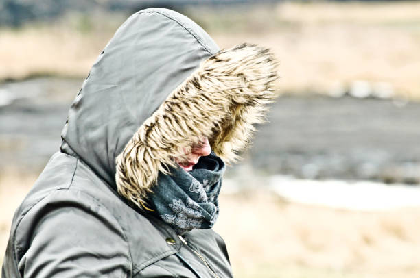 istock Woman posing outdoors in the cold 1131256669