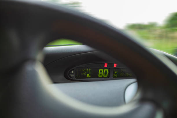 istock Car dashboard steering wheel and speedometer show speed 1131257143
