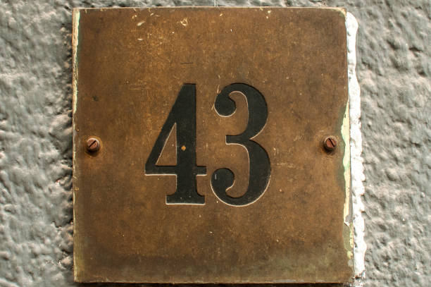 istock Old retro cast iron plate number 43 1131258451