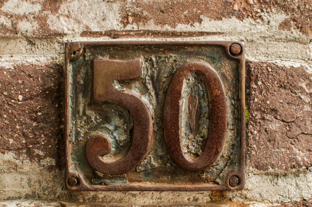 istock Old retro cast iron plate number 50 1131258506