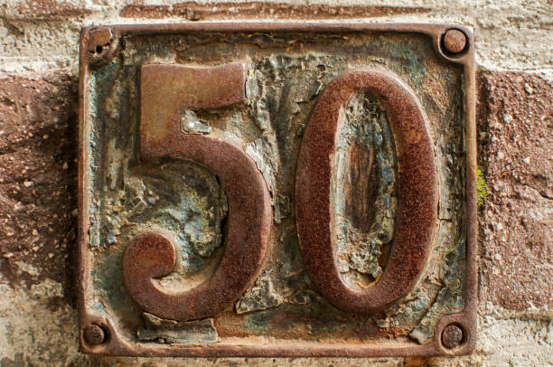istock Old retro cast iron plate number 50 1131258515