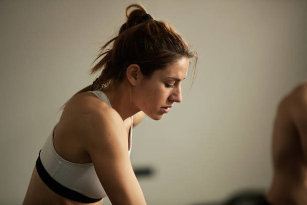 istock Young dedicated sportswoman during workout in a gym. 1131260061