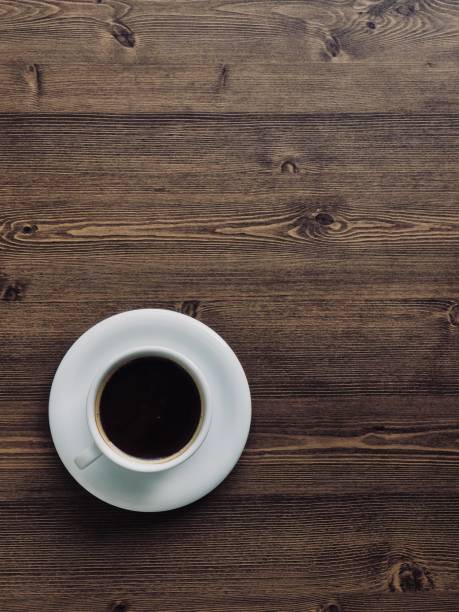 istock Wooden board background with coffee 1131263263
