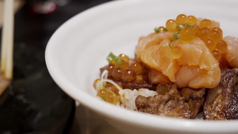 Foie gras urchin Ikura don.served over rice.