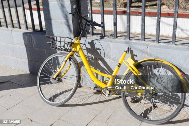Discarded And Vandalized Ofo Bicycle Stock Photo - Download Image Now - Bicycle, Cycling, Broken