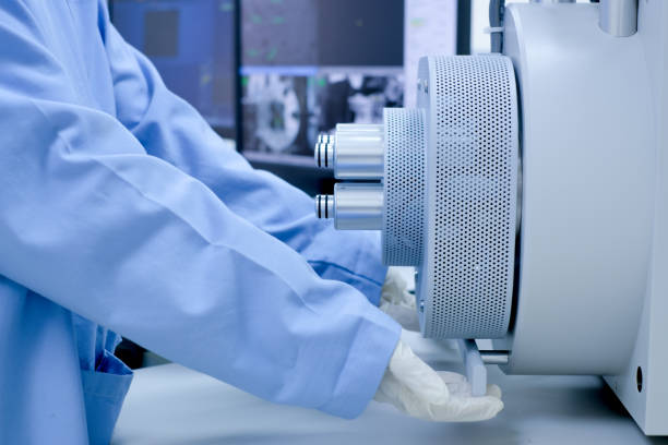 istock Scientist are opening the nanomaterials for Scanning Electron Microscope (SEM) machine in laboratory 1131273824