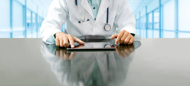 istock Doctor with tablet computer at hospital office. 1131274761