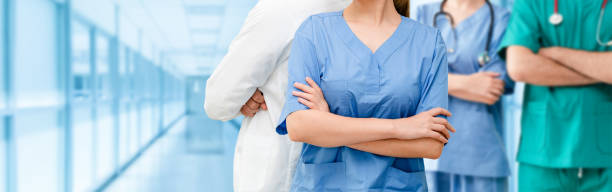 istock Doctor working in hospital with other doctors. 1131277385