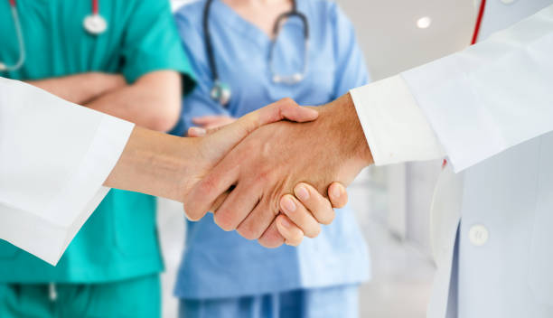 istock Doctor working in hospital with other doctors. 1131277400
