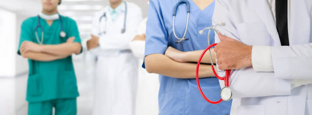 istock Doctor working in hospital with other doctors. 1131277677