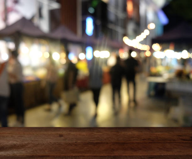 istock Empty wood table top on blur abstract Night Festival Event Party background. can be used for display or montage your products 1131278286