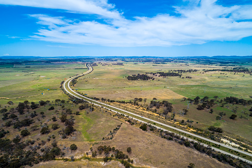 Hume Highway winding through countryside . Cullerin, New South Wales, Australia