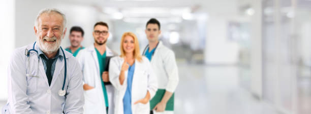 istock Doctor working in hospital with other doctors. 1131280133