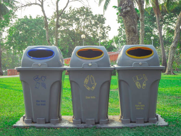 istock three bin in fresh green park with recycle , reuse and reduce symbol 1131285134