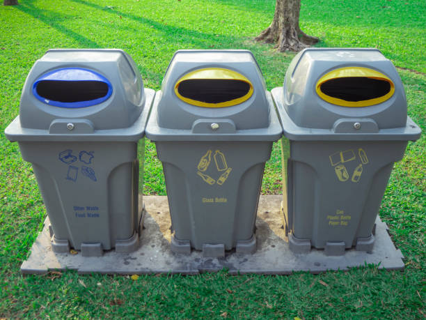 istock three bin in fresh green park with recycle , reuse and reduce symbol 1131285199
