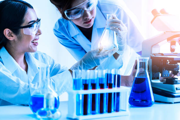 istock Group of scientists working in chemical lab. 1131285248