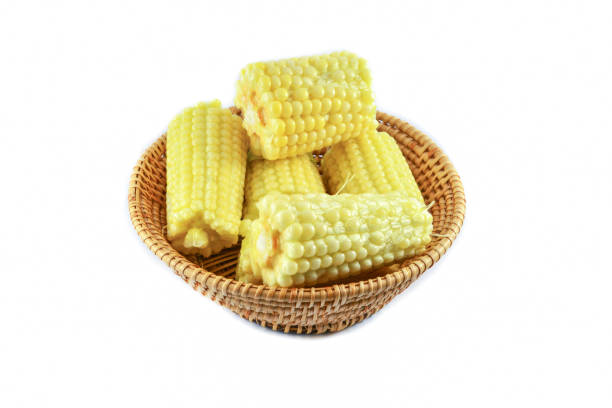 istock Close up of young baby sweet corn ear in fresh corn cob 1131286682
