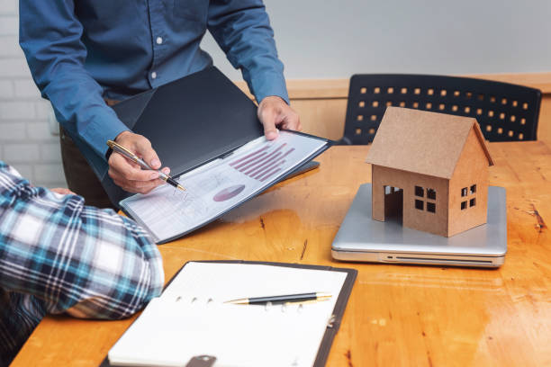 istock Real estate agent showing his client about property detail. 1131288543