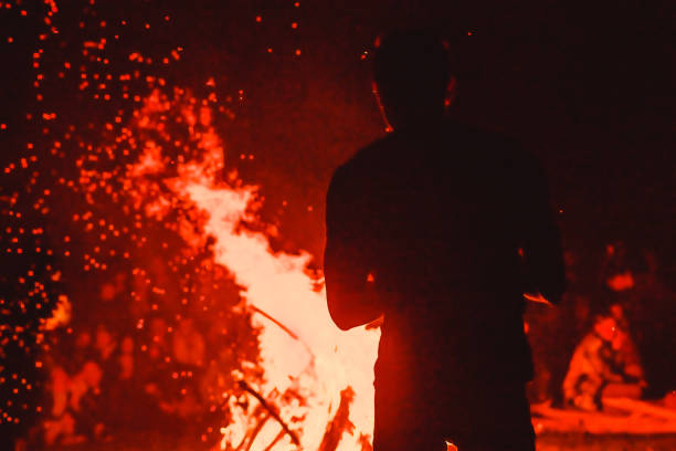 istock people look at the fire 1131290360