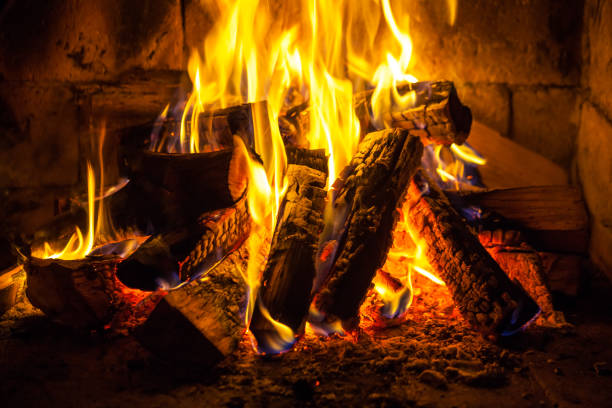 istock Wood burning in a cozy fireplace at home, keep warm 1131290587