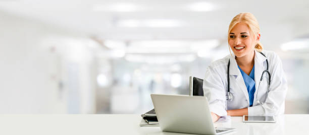 istock Doctor using laptop computer at the hospital. 1131291361