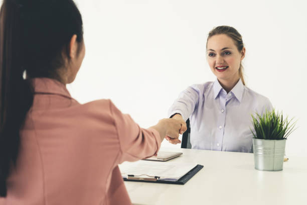 istock Two young business women meeting for interview. 1131293656