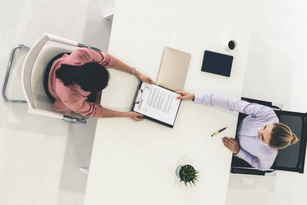 istock Two young business women meeting for interview. 1131293679
