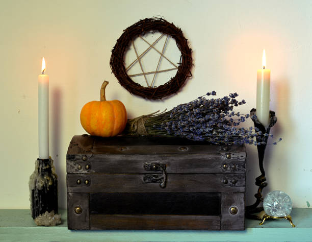 istock Old box with lavender flowers, pumpkin and pentagram 1131294577