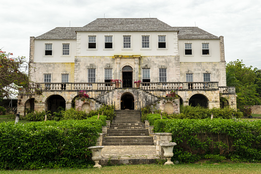 Montego Bay, Jamaica  - June 05 2015: Front view of the Rose Hall Great House in Montego Bay, Jamaica. Popular tourist attraction. Vintage architecture. Days of slavery.