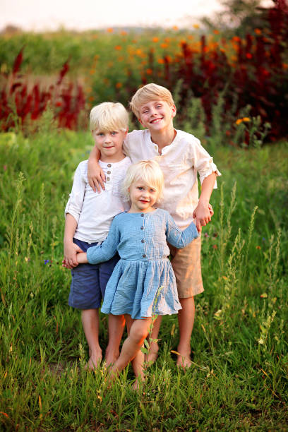 Sibling Poses Stock Photos, Pictures & Royalty-Free Images - iStock