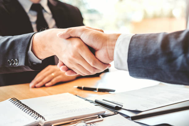 istock Shaking hands Business people greeting new colleagues while job interviewing shaking hands meeting Planning after during job interview Concept 1131299202