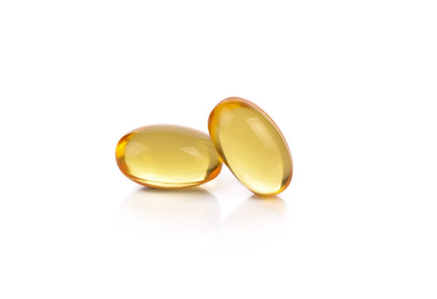 istock Fish oil supplement capsule isolated on white background 1131299315