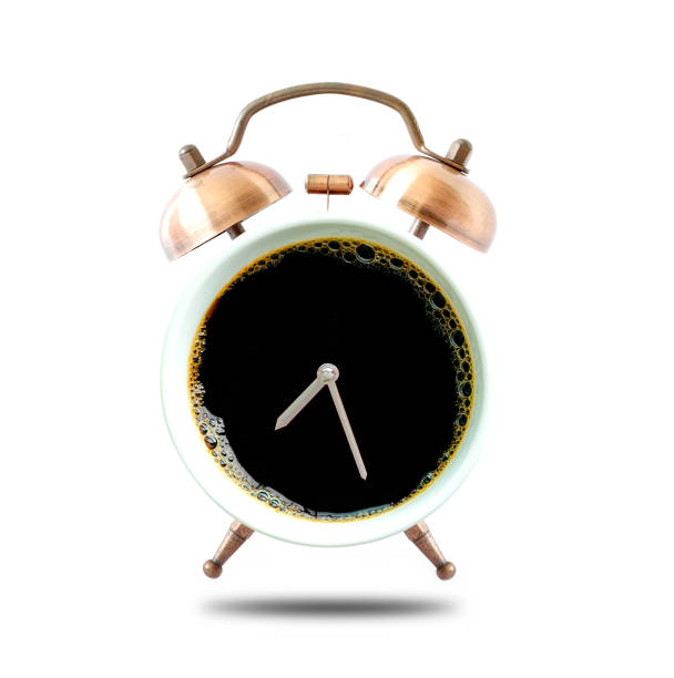 Antique clock needles, black coffee and americano for starting refresh in a new day by drinking every morning. Healthy food , Drinking  and morning concept.