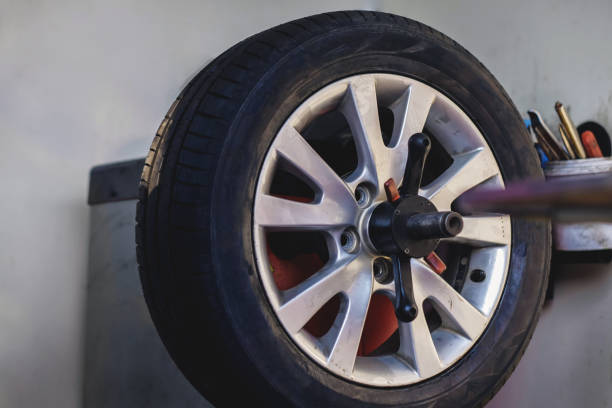 istock Tire Replacement concept. Garage' Tools and Equipment. Car Maintenance and services 1131302555