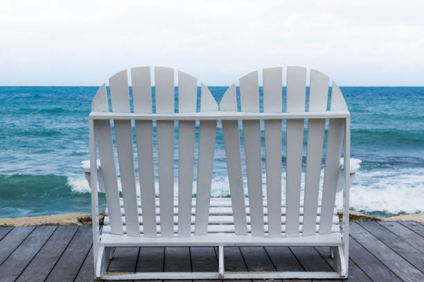 istock Empty white wooden beach chair 1131303945