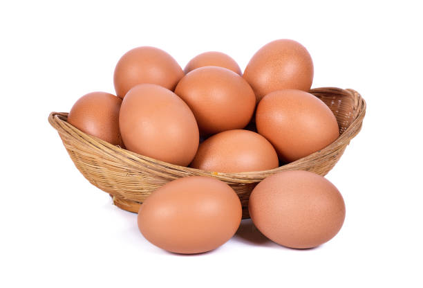 istock eggs in basket isolated in white background 1131305600