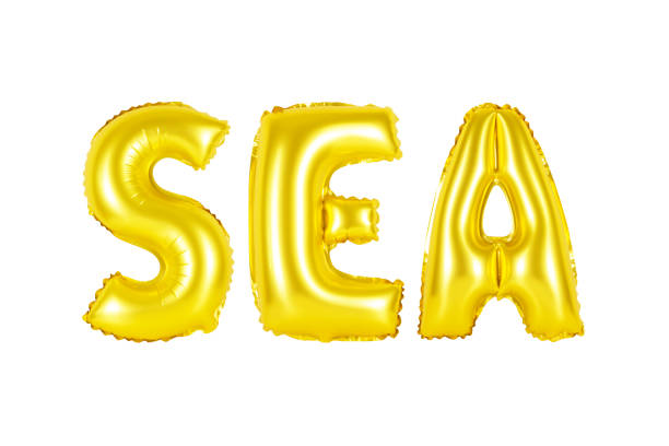 istock Gold alphabet balloons, sea 1131309856