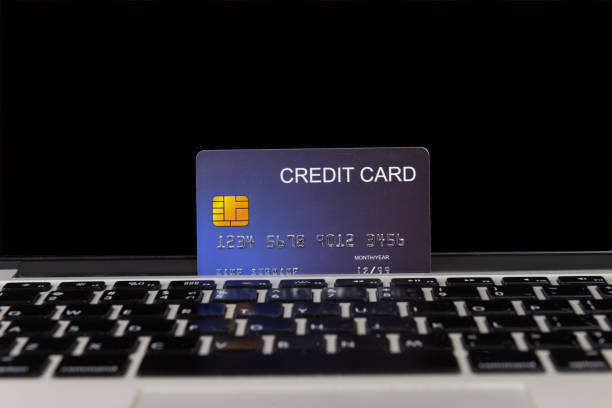 istock credit card place on laptop 1131312359