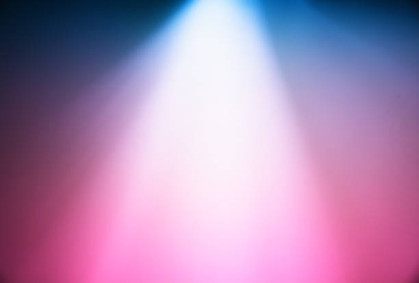 istock Dramatic pink and blue illumination from the top bokeh background 1131312809