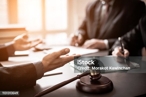 istock Lawyers consulted on various lawsuits. 1131313549