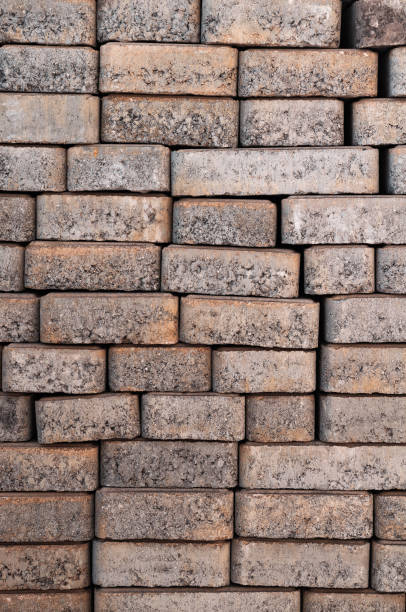 istock Textured background of dark old shabby bricks close up 1131313740