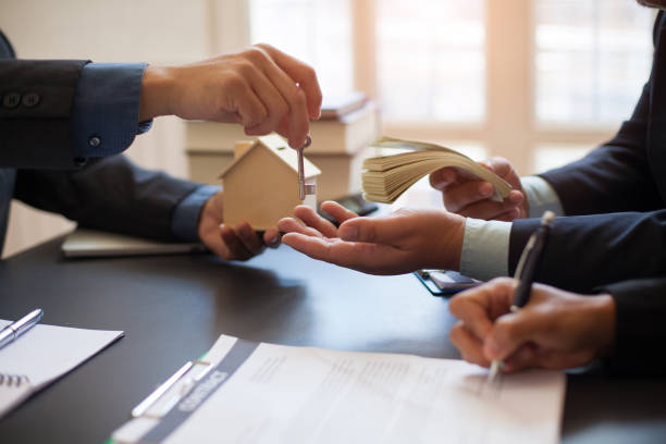 istock Signing contract for buying and selling house 1131314107